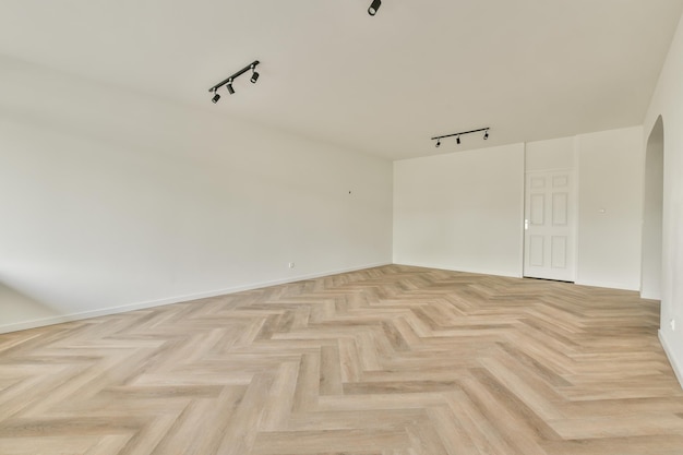 Empty living room with open kitchen