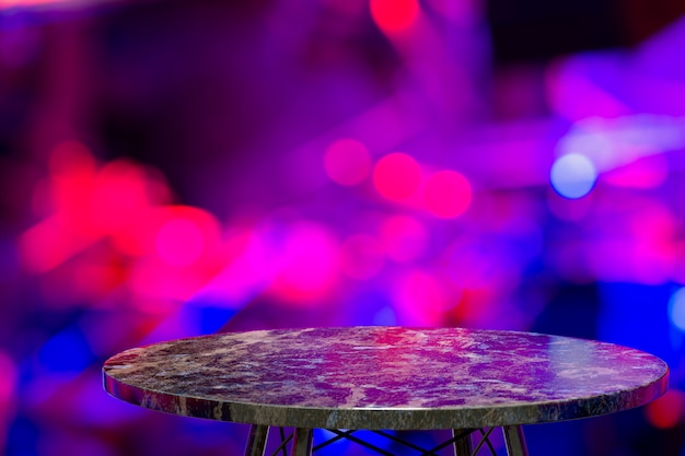 Empty marble table for display of products in front of restaurant