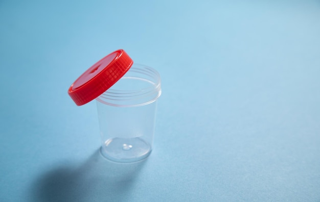 Empty medical container on the blue background