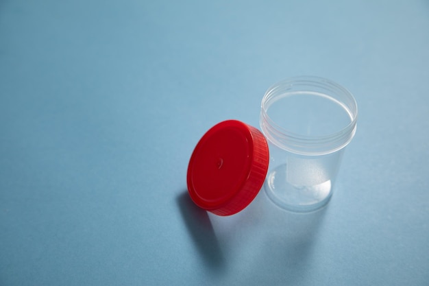 Empty medical container on the blue background