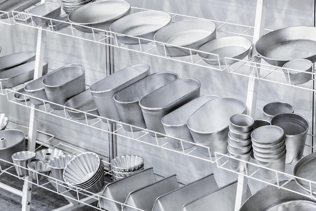 Empty metal molds trays and racks for baking bread and bakery products