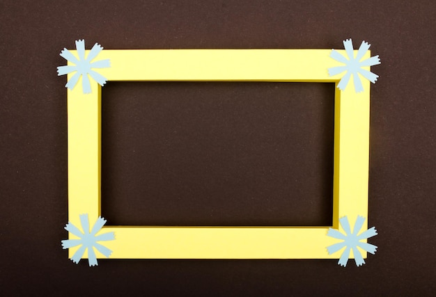 Empty mockup frame with crafting paper flowers isolated on paper background