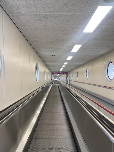 Empty moving walkway for passengers at the port or airport