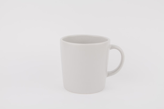 Empty new gray cup on white background