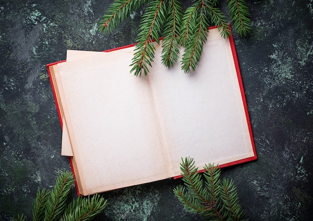 Empty notebook with tree branches. Top view