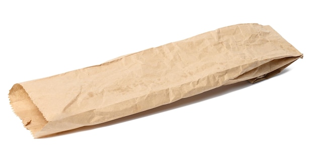 Empty oblong paper bag for a baguette on a white isolated background