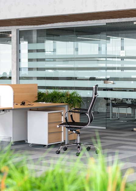 Empty office chair in the bussines center, nobody to work, vertical