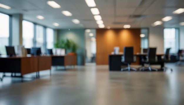 an empty office with a large window and a plant in the background