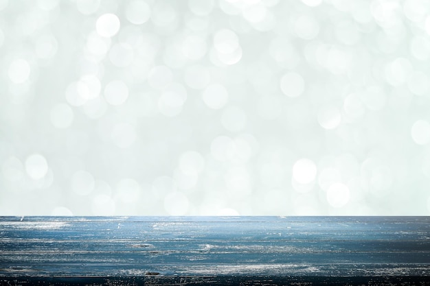 Empty old grunge wood plank table top with bokeh lights abstract blur,