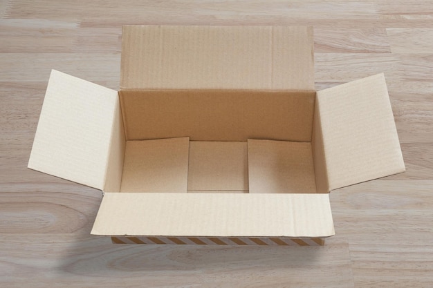 Empty open brown cardboard box