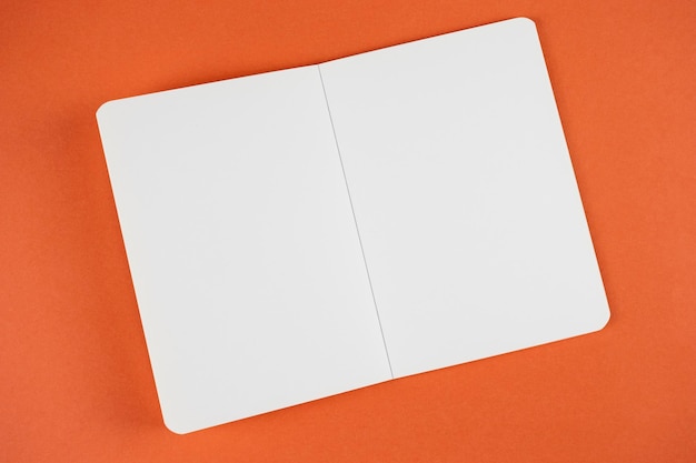 Empty open notebook with white blank paper page