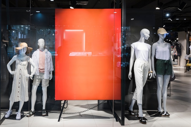 Empty orange sign in clothing store