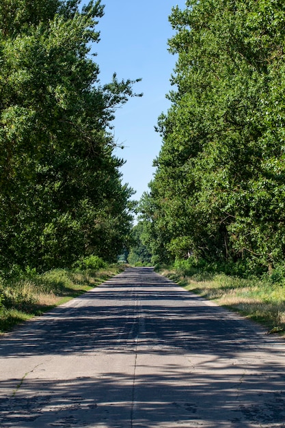 An empty paved road in the countryside