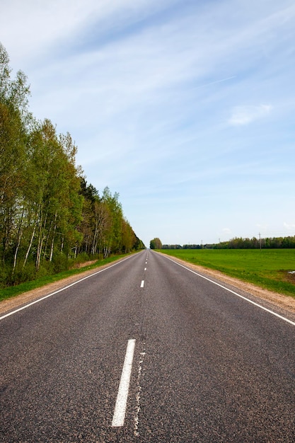 An empty paved road in the countryside