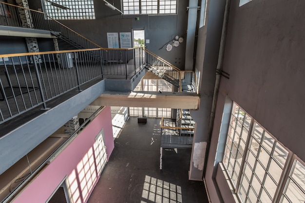 empty public place with huge windows and sun light