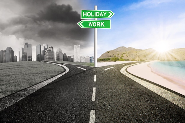 Empty road with signpost to holiday or work