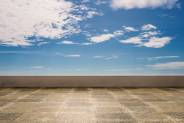 Empty roof top with cloudy sky background