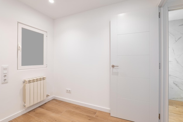 Empty room with frosted glass to avoid watching by neighbours.