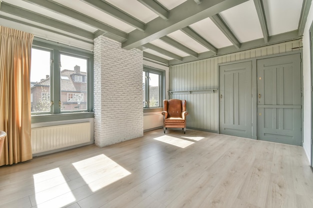 Empty room with white walls and parquet floor