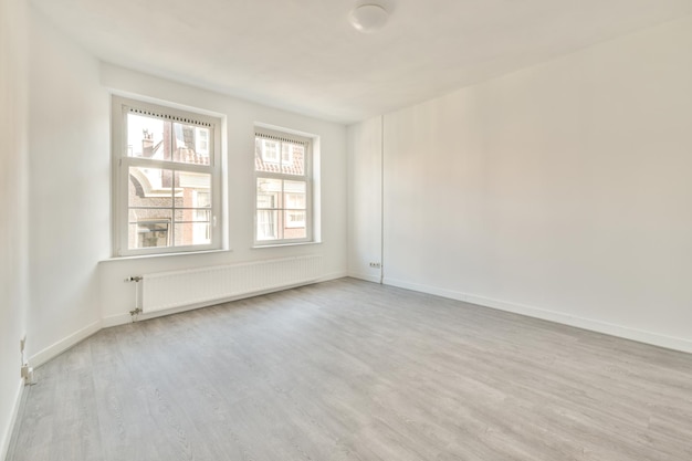 Empty room with window and radiator