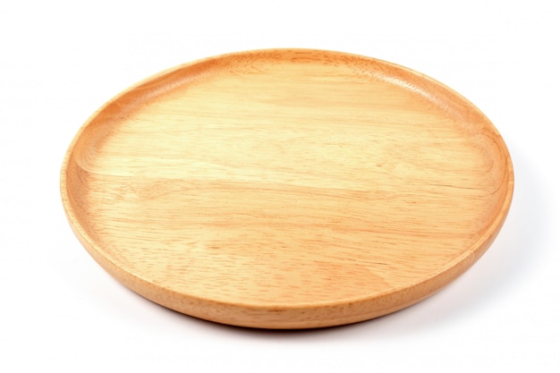 Empty round wood plate on white