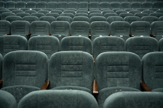 Empty rows of seats in the hall for a large number of people Cinema and theatre hall for watching performances