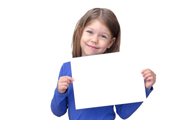 Empty sheet as mockup in smiling child hands