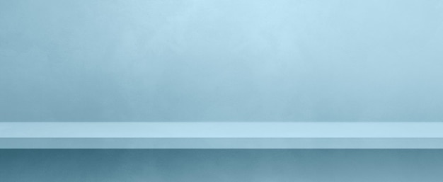 Empty shelf on a light blue concrete wall Background template Horizontal banner mockup