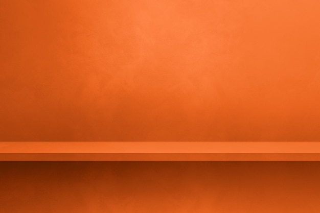 Empty shelf on a neon orange concrete wall Background template Horizontal mockup