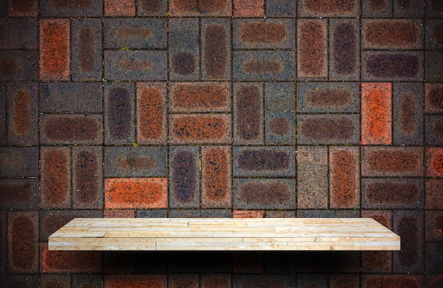 Empty shelf product display on Red brick wall background