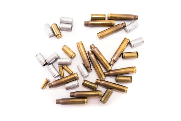 Empty shells for shooting on a white surface.