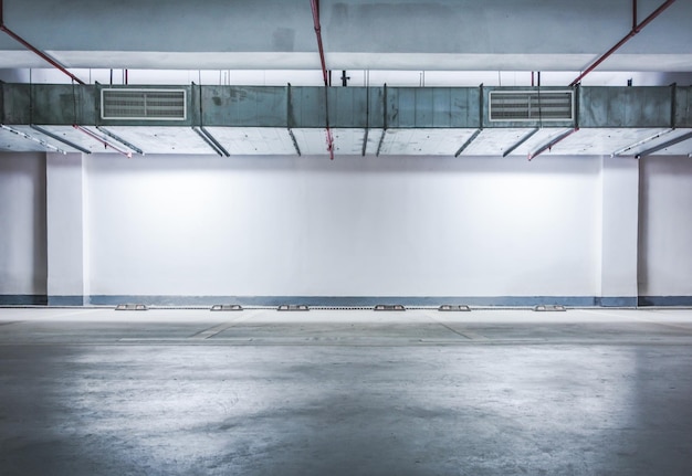 Empty space car park interior at night