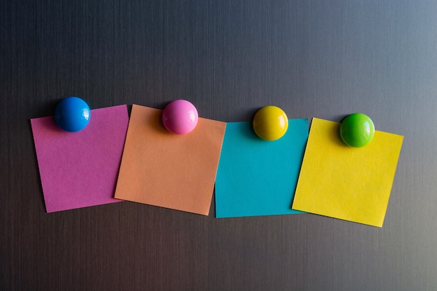 Empty stickers for notes on the refrigerator attached with magnets.