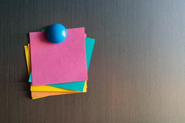 Empty stickers for notes on the refrigerator attached with magnets.