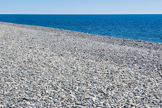 Empty stone beachsea and sky