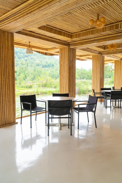 Empty table and chair in restaurant with nature view