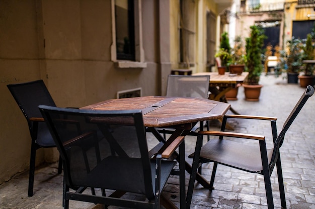 Empty tables and chairs nobody tourist in the street curfew tourism