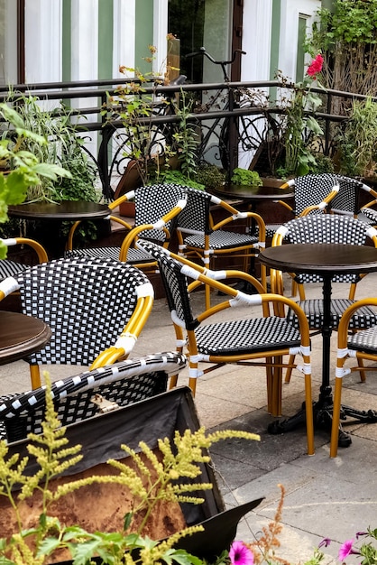 Empty tables in outdoor cafe in summer