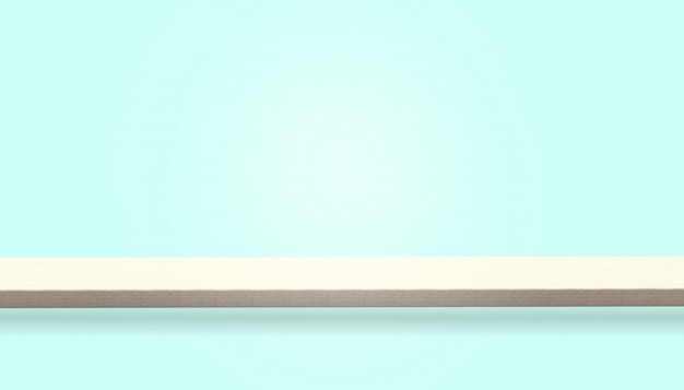 Empty top of wood table or counter isolated on blue background, can be used for display or montage your products