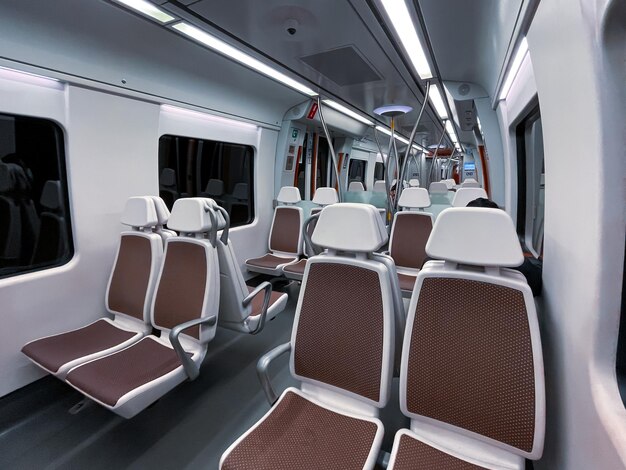 empty train car seats, train mode of transportation