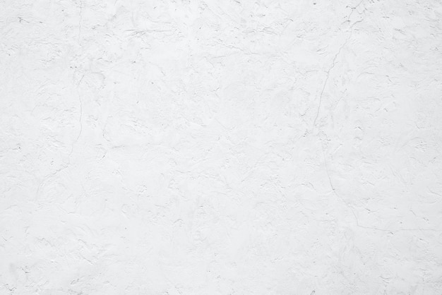 Empty white building wall texture background Rough surface and cracked white cement wall White wall