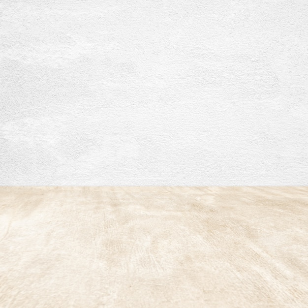 Empty white cement wall and brown floor