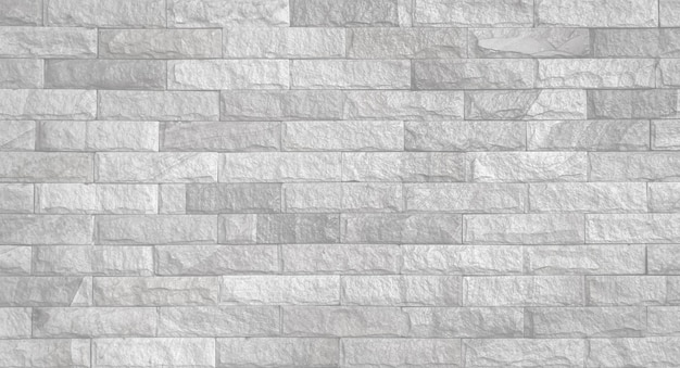 Empty white light gray embossed stone brick wall made with blocks for abstract background and texture beautiful patterns space for work banner wallpaper close up horizontal