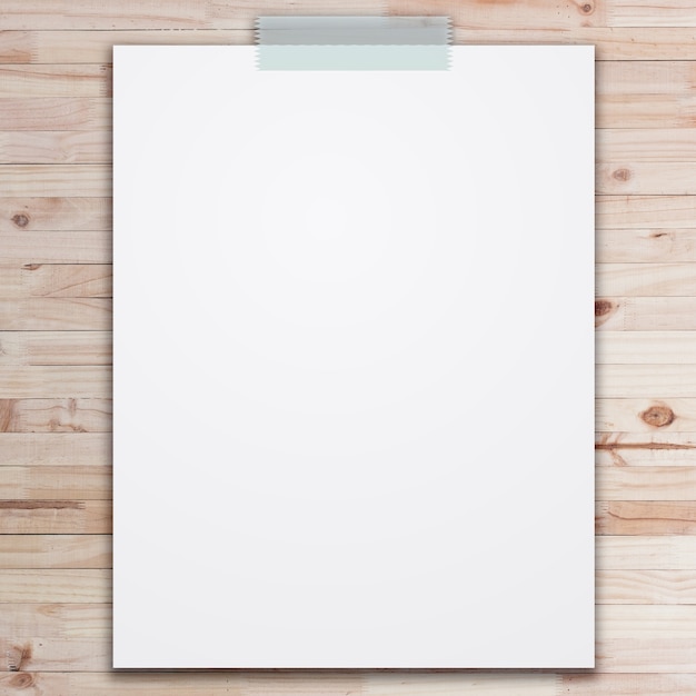 empty white paper sheet on wood background.