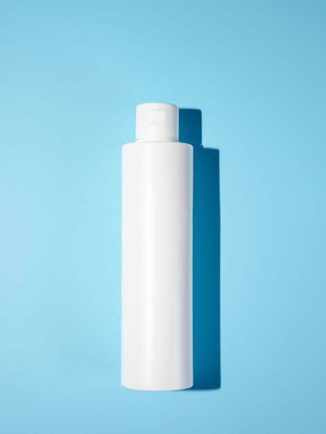 Empty white plastic opaque bottle mockup top view