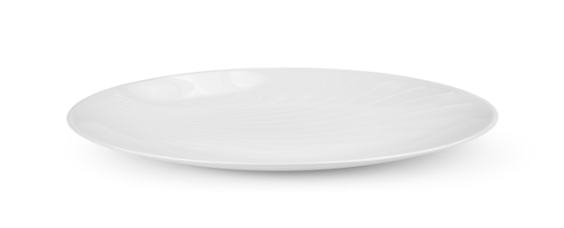 Empty white plate on a white wall