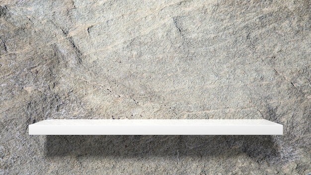 Empty white wall shelf on stone wall