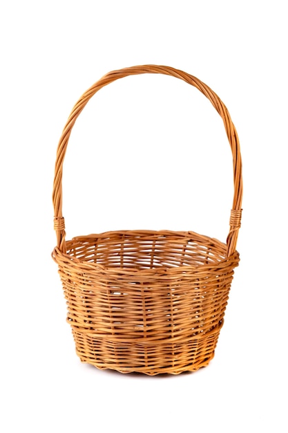 Empty wicker basket for fruits and vegetables, isolated on white