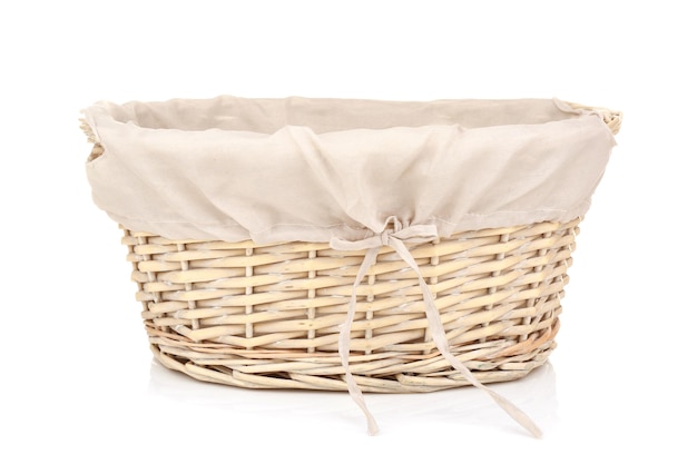 Empty wicker basket on white background