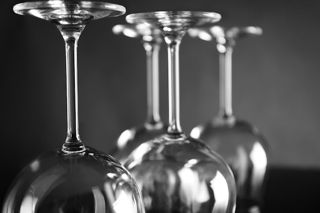 Empty wine glasses on dark background closeup